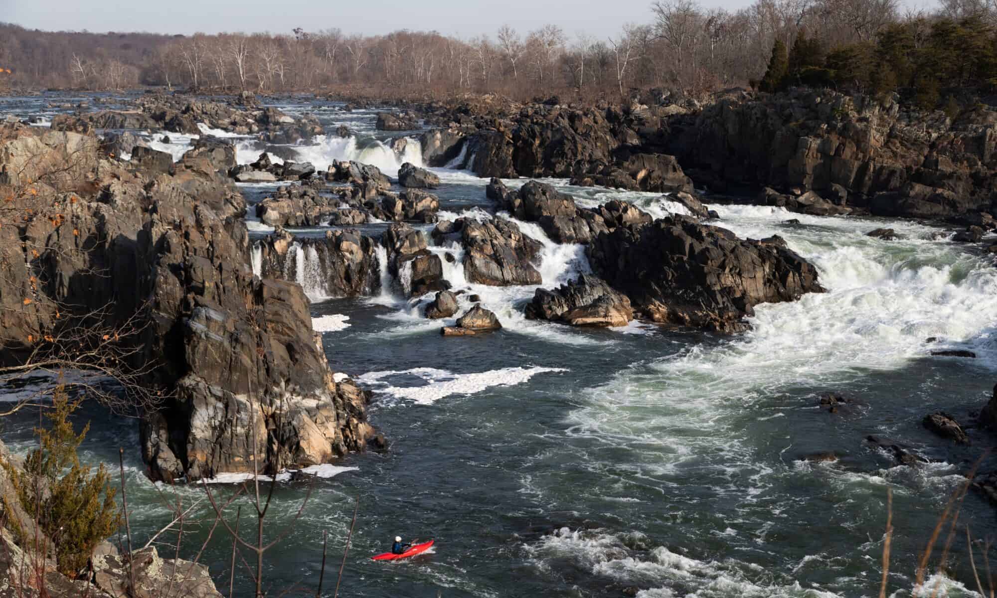 A kayaker navigates the falls in Great Falls Park in Virginia